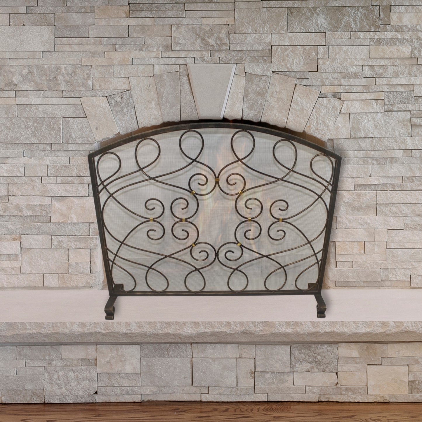 Iron Loop Design Fireplace Screen with Arched Top - Single Panel Fire Screen in front of stone fireplace | InsideOutCatalog.com