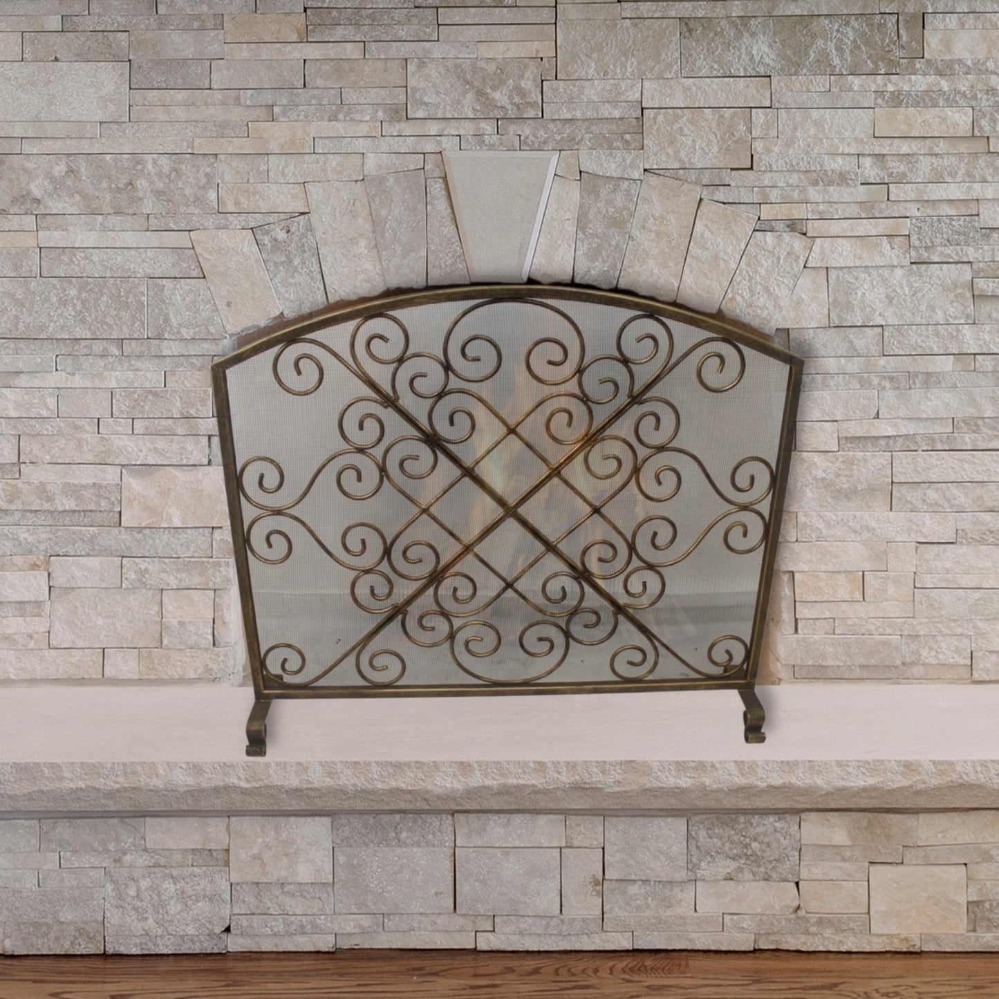 Iron Scroll Design with X in the Center Fire Screen - Single Panel Fireplace Screen with Arched Top in front of stone fireplace | InsideOutCatalog.com