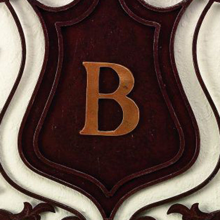 Personalized Wrought Iron Wall Grille - Monogrammed Iron Shield (28.5"W) | Estate Quality Home Decor | Personalized Wall Decor | Shown with the Monogram "B" | Iron finished in a rustic brown gold stain with Italian gold 5" monogram (close up of monogram letter) | INSIDE OUT | InsideOutCatalog.com