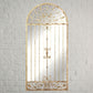 Antique Gold European Inspired Arched Garden Gate Mirror on white brick wall | INSIDE OUT | InsideOutCatalog.com