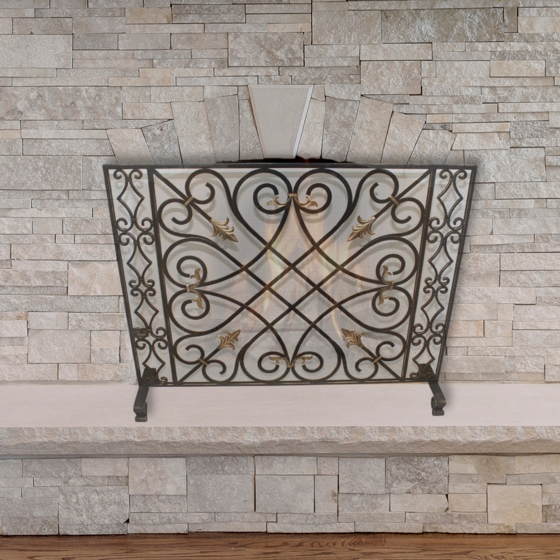 Burnished Gold Gate Design Single Panel Fireplace Screen with Gold Accents in front of stone fireplace | InsideOutCatalog.com