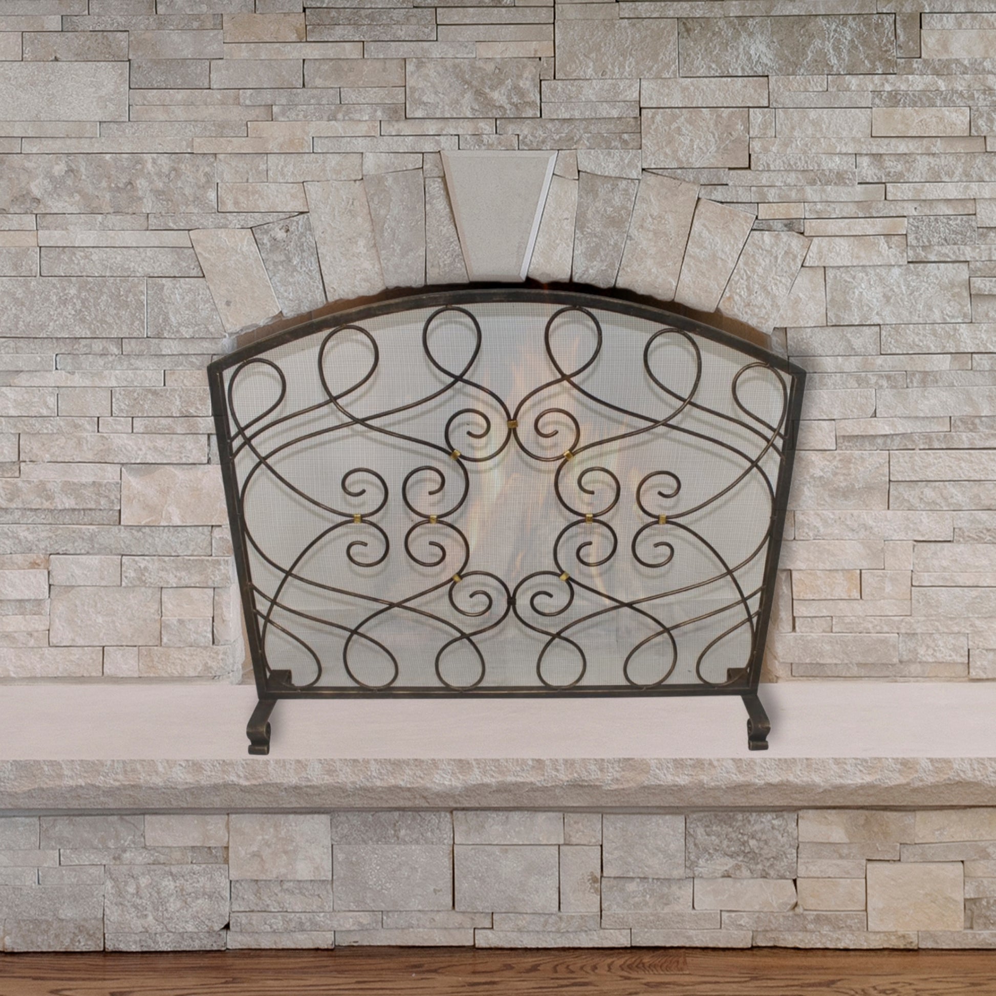 Iron Loop Design Fireplace Screen with Arched Top - Single Panel Fire Screen in front of stone fireplace | InsideOutCatalog.com