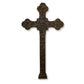 A large decorative iron wall cross with intricate designs, finished in brown taupe, displayed against a white background | INSIDE OUT - InsideOutCatalog.com