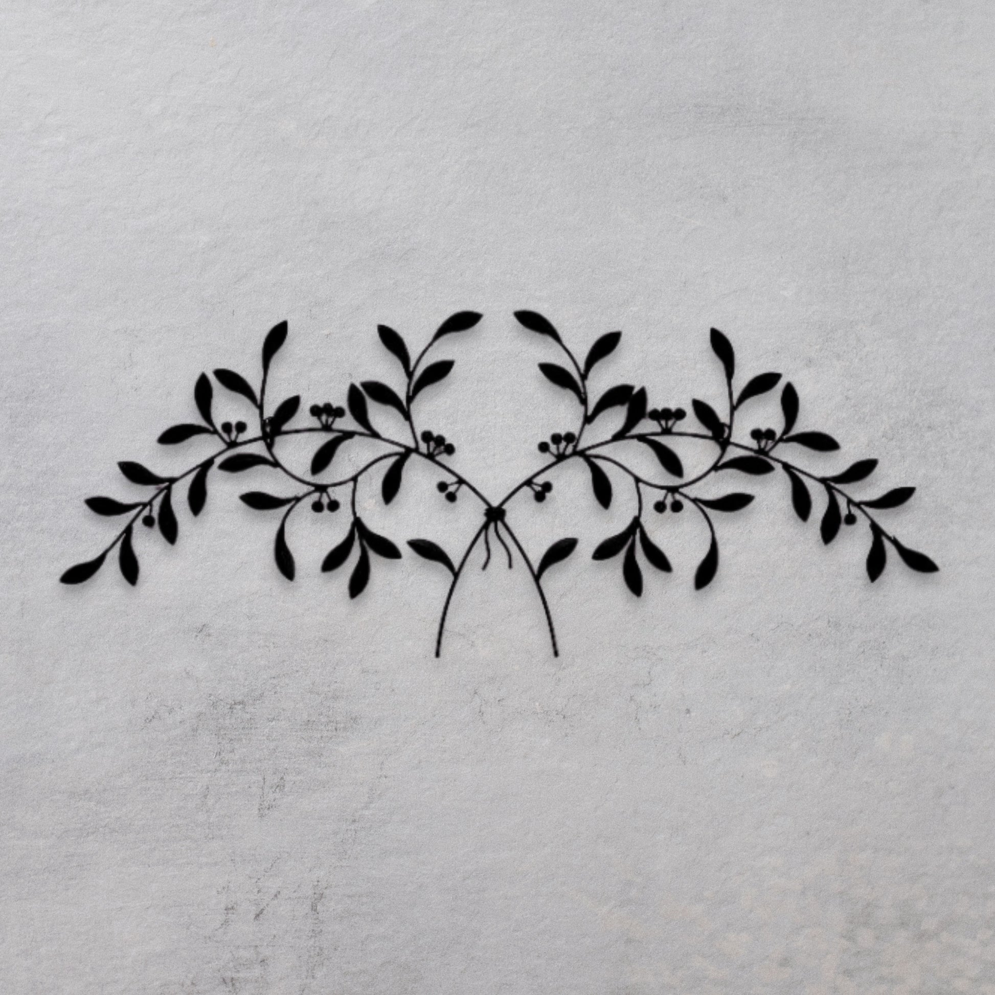 Olive Leaf Iron Wall Grille - Black Metal Wall Decor on textured grey wall | INSIDE OUT | InsideOutCatalog.com