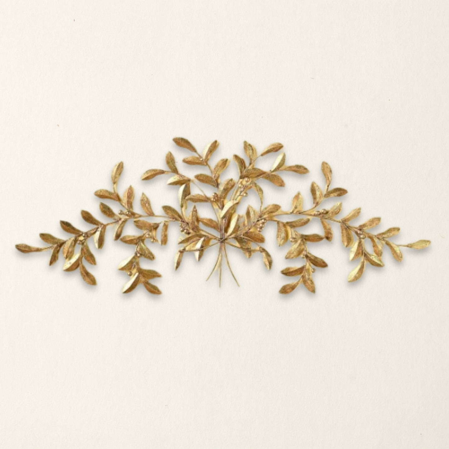 Large Italian Gold Iron and Tole Wall Decor - Olive Leaf Iron Wall Grille on beige wall | INSIDE OUT | InsideOutCatalog.com