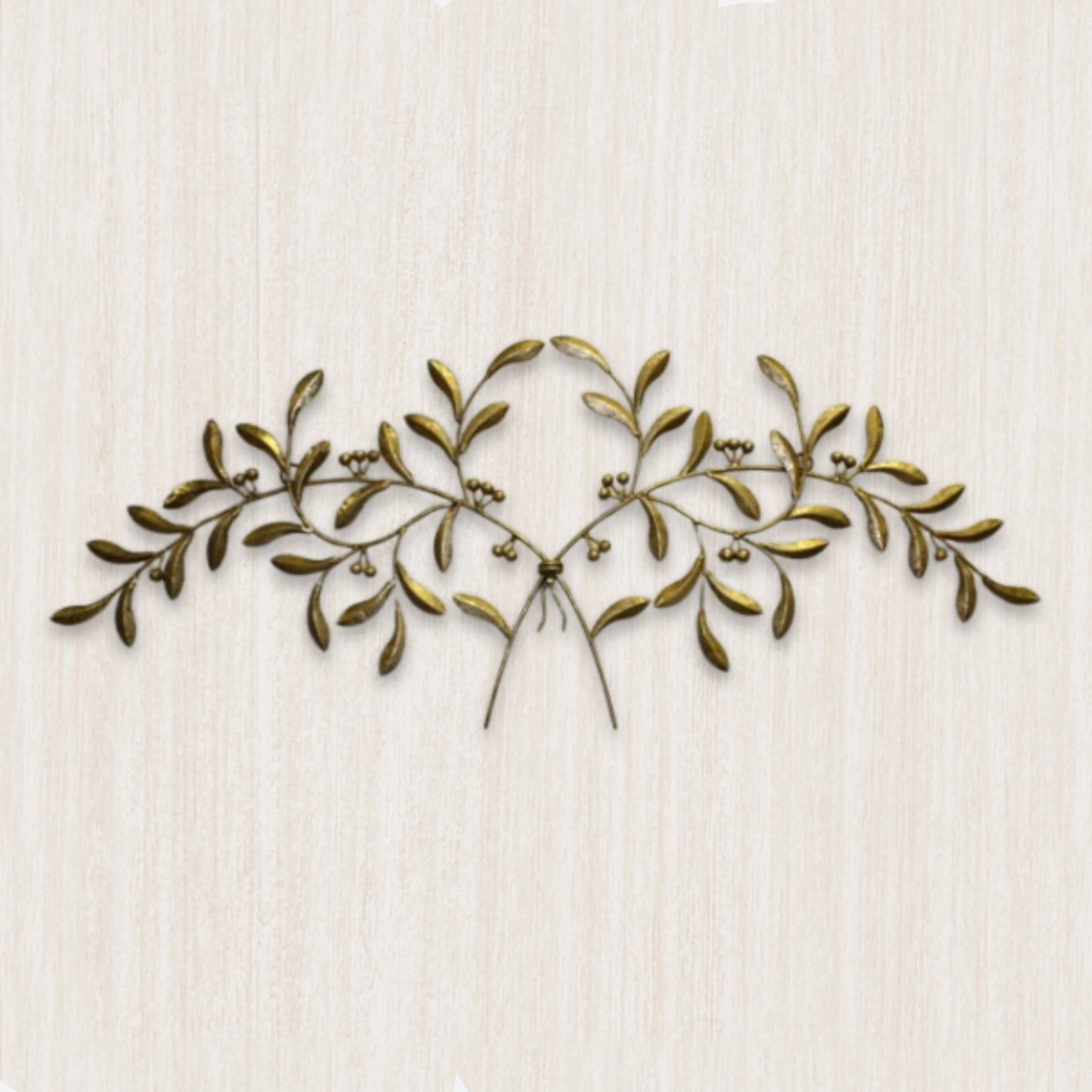 Olive Leaf Iron Wall Grille - Italian Gold Metal Wall Decor on beige textured wall | INSIDE OUT | InsideOutCatalog.com