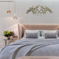 Olive Leaf Iron Wall Grille - Italian Gold Metal Wall Decor | Modern bedroom with a bed, decorative pillows, and wall art Olive Leaf Iron Wall Grille - Italian Gold Metal Wall Decor | INSIDE OUT - InsideOutCatalog.com