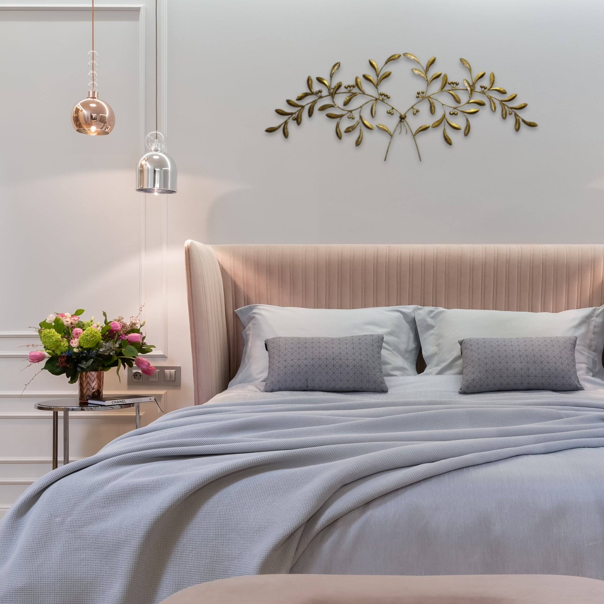 Olive Leaf Iron Wall Grille - Italian Gold Metal Wall Decor | Modern bedroom with a bed, decorative pillows, and wall art Olive Leaf Iron Wall Grille - Italian Gold Metal Wall Decor | INSIDE OUT - InsideOutCatalog.com