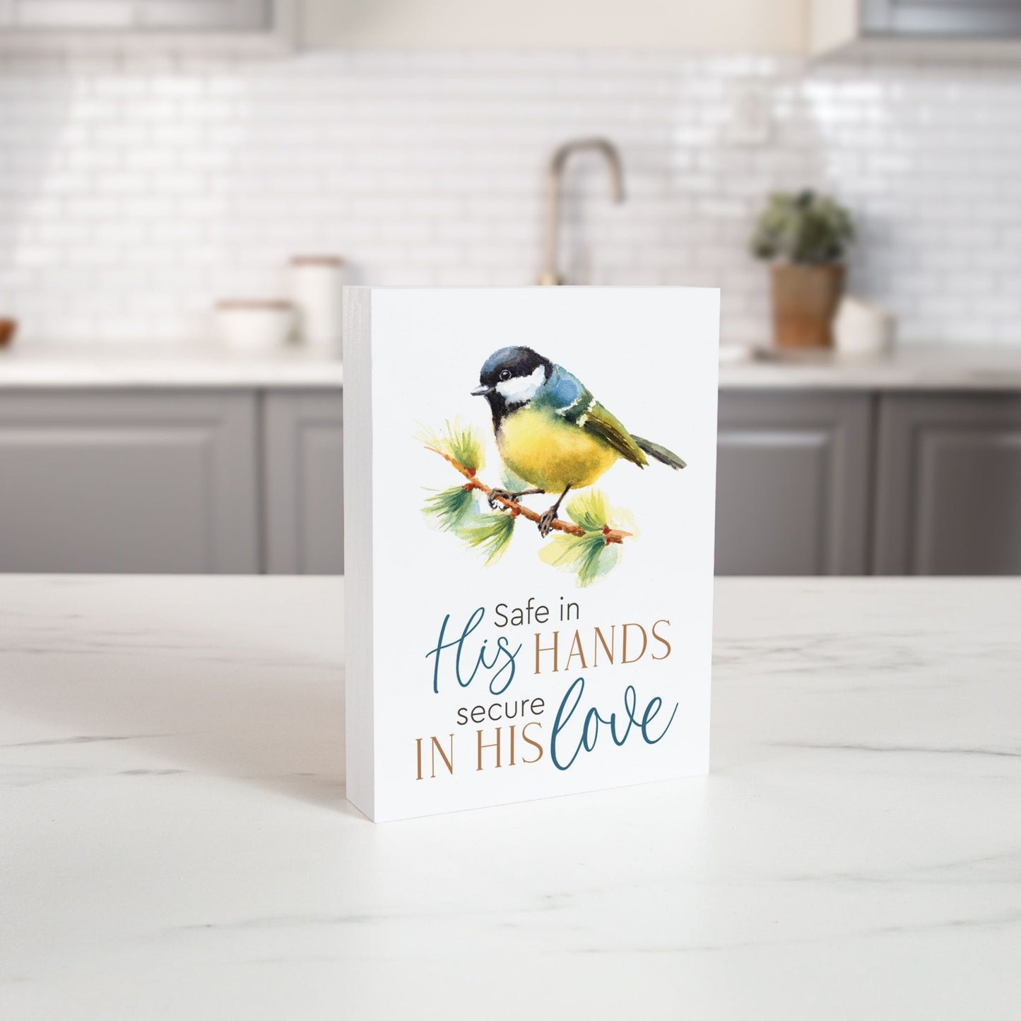 Inspirational Wood Block with Bird Artwork - Safe in His Hands, Secure in His Love on kitchen counter | InsideOutCatalog.com