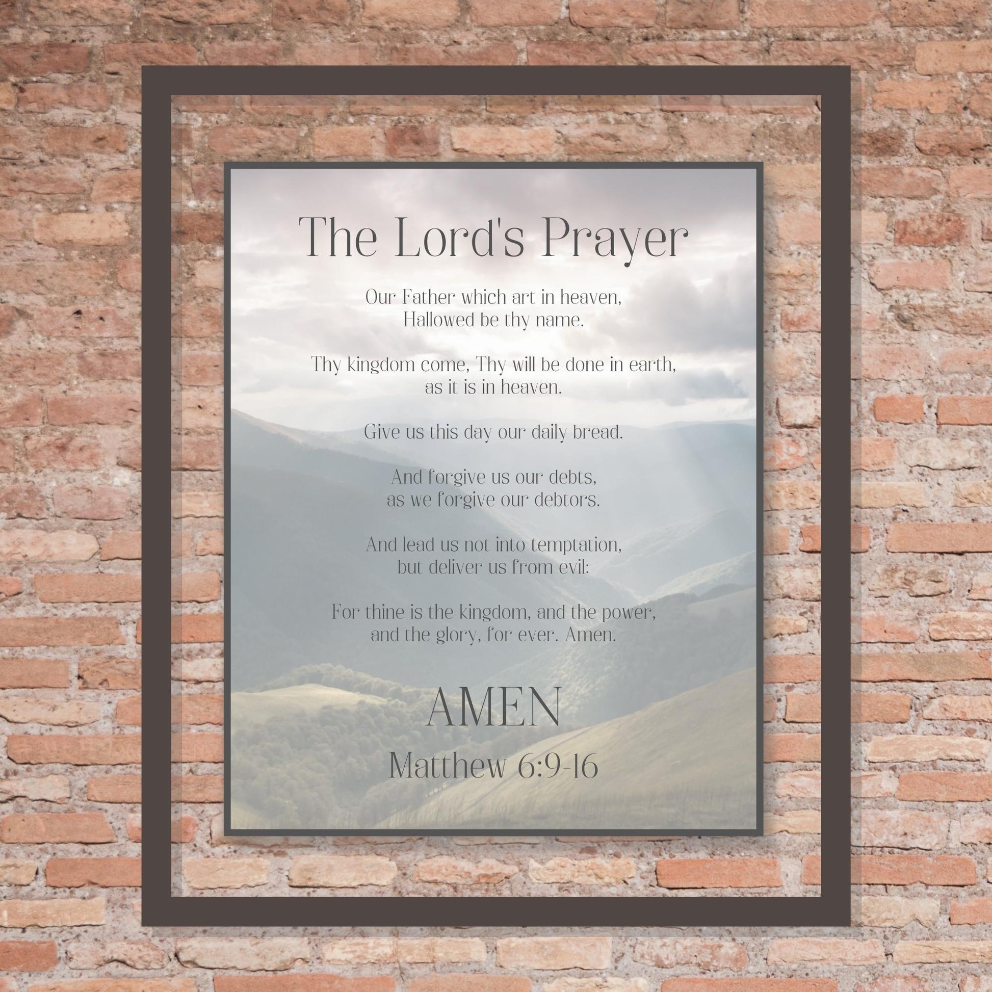 The Lord's Prayer, Our Father (Matthew 6:9-16) Bible Verse Wall Art - Inspirational Christian Wall Poster (16x20) shown framed on a brick wall  | InsideOutCatalog.com