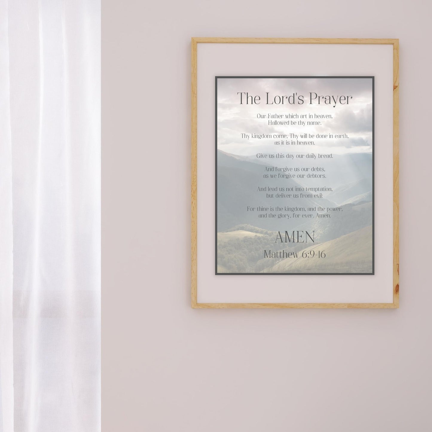 The Lord's Prayer, Our Father (Matthew 6:9-16) Bible Verse Wall Art - Inspirational Christian Wall Poster (16x20) shown framed on wall next to sheer curtain | InsideOutCatalog.com