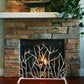 Antique White Iron Twig Decorative Fire Screen in front of fireplace with gas insert | InsideOutCatalog.com