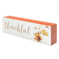 Decorative block with 'thankful' text and autumn leaves on a white background | InsideOutCatalog.com