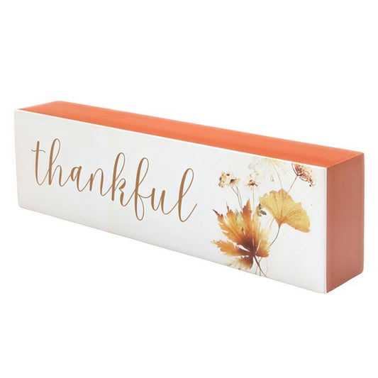 Decorative block with 'thankful' text and autumn leaves on a white background | InsideOutCatalog.com
