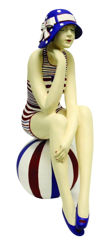 Bathing Beauty Figurine on Beach Ball – Red, White, and Blue Striped Swimsuit, Matching Sun Hat, and Beach Ball | Collectible Figurine | Coastal Living | Beach style home accent | Fourth of July decoration | Americana Figurine | INSIDE OUT | InsideOutCatalog.com