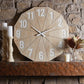 Natural Finished Wood Clock - Subtle Rustic Style Wall Clock - Timeless Wall Decor (31") | Shown on stone fireplace resting on rustic mantle | INSIDE OUT | InsideOutCatalog.com