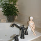 Spa Girl Beauties - Resin Collectible Statuary - Spa Girl with Knees Up shown in Master Bathroom | INSIDE OUT | InsideOutCatalog.com
